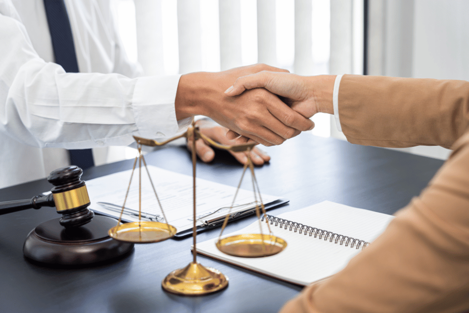 legal professionals handshaking